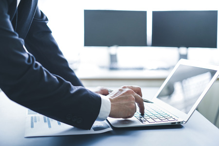 Young businessman in casual clothes at modern startup business office spaceの写真素材