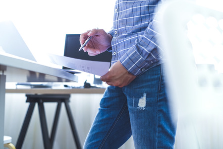 Young businessman in casual clothes at modern startup business office space