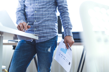 Young businessman in casual clothes at modern startup business office space