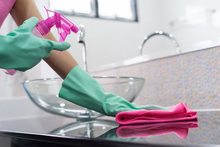 Asian woman Cleaning bathroomの写真素材