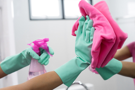 Cleaning concept. Asian woman washing windowの写真素材