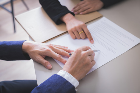 Business man signing a contract