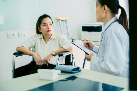 Female doctor consulting patient. Asian peopleの写真素材