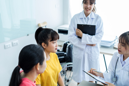 Female doctor consulting patient. Asian peopleの写真素材