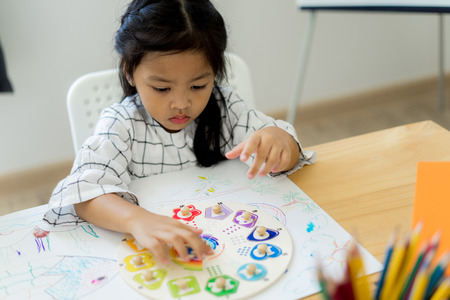 Asian cute little child girl drawing at home. Education conceptの写真素材
