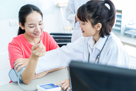 Female doctor consulting patient. Asian peopleの写真素材