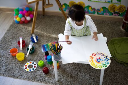 Asian cute little child girl drawing at home. Education conceptの写真素材