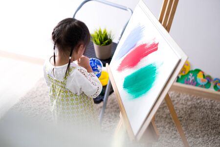 Asian cute little child girl drawing at home. Education conceptの写真素材