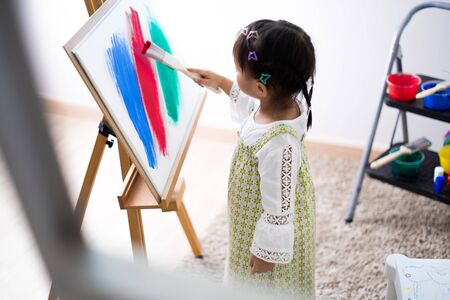 Asian cute little child girl drawing at home. Education conceptの写真素材