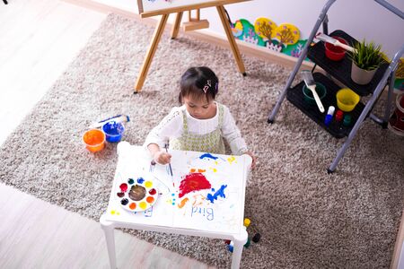 Asian cute little child girl drawing at home. Education conceptの写真素材