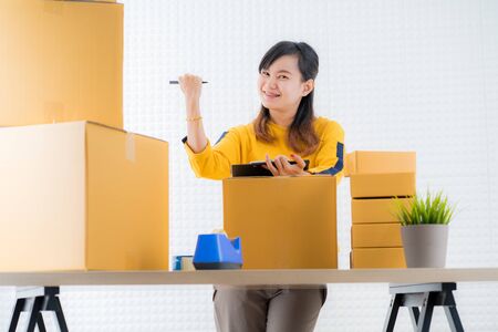 Teenager business owner work at home, young entrepreneurの写真素材