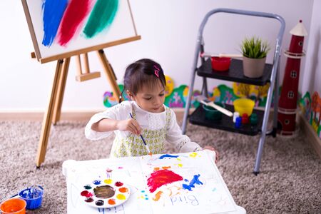 Asian cute little child girl drawing at home. Education conceptの写真素材