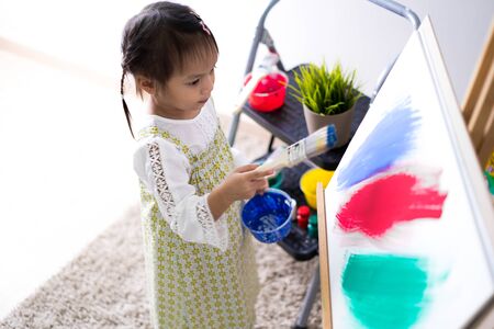 Asian cute little child girl drawing at home. Education conceptの写真素材