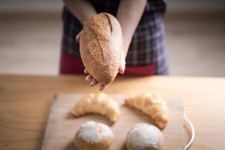 Woman Hands Hold Wooden Tray Present Fresh Baked Bakery