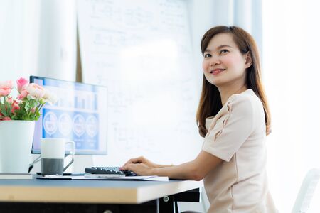 Young asia woman working at home or in a small office. Asian peopleの写真素材