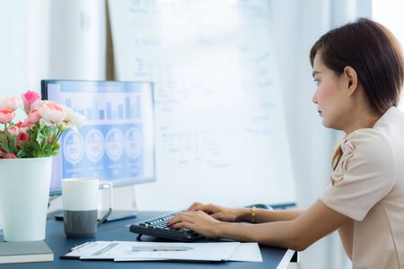 Young asia woman working at home or in a small office. Asian people