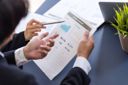 Group of business people busy discussing financial matter during meeting. Asian peopleの写真素材