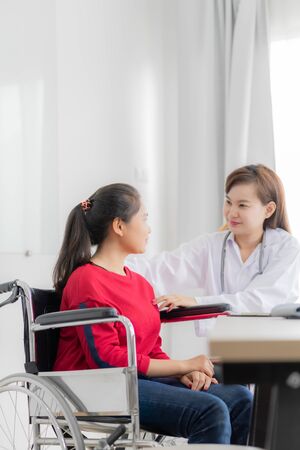 Female doctor consulting patient. Asian peopleの写真素材