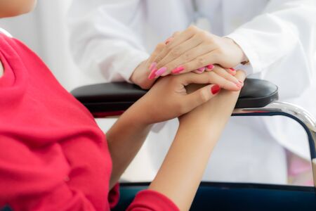 Female doctor consulting patient. Asian peopleの写真素材
