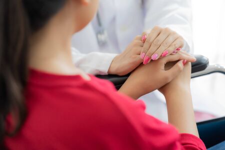 Female doctor consulting patient. Asian peopleの写真素材