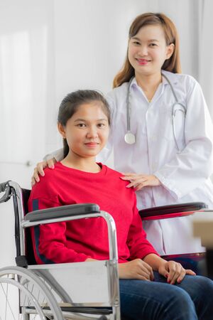 Female doctor consulting patient. Asian peopleの写真素材