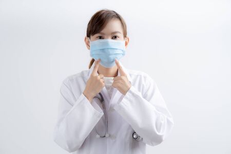 Doctor woman wearing protection face mask against coronavirus.Asian peopleの写真素材