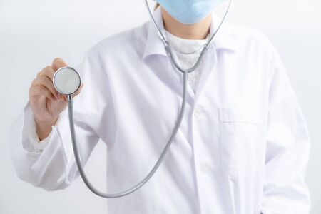 Doctor woman wearing protection face mask against coronavirus.Asian peopleの写真素材