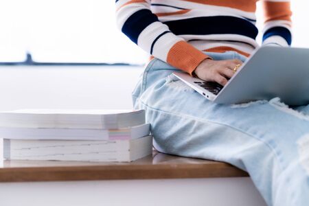 Asia student studying with laptop at home. Education Concept. Asian peopleの写真素材