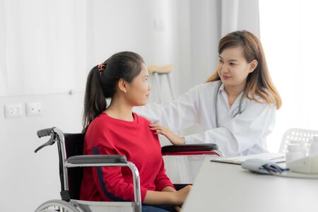 Female doctor consulting patient. Asian peopleの写真素材