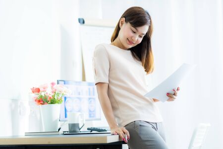 Young asia woman working at home or in a small office. Asian peopleの写真素材