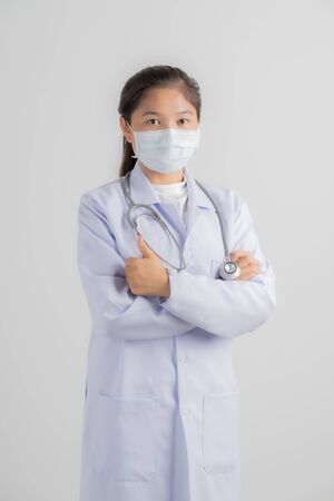 Doctor woman wearing protection face mask against coronavirus.Asian peopleの写真素材