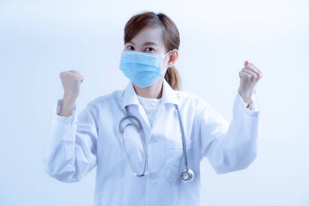Doctor woman wearing protection face mask against coronavirus.Asian peopleの写真素材