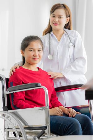 Female doctor consulting patient. Asian peopleの写真素材