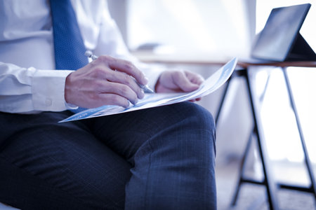 Businessman doing finances and calculate about cost, Business Financing Accounting Banking Conceptの写真素材