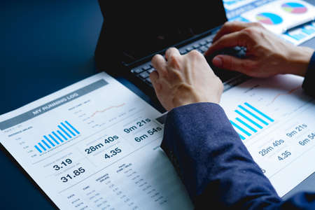 Businessman doing finances and calculate about cost to investment , business Financing Accounting...