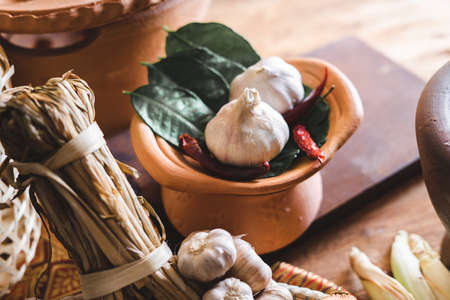 Various fresh vegetables and spices on wooden table, Thai food conceptの写真素材