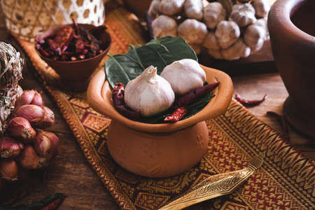 Various fresh vegetables and spices on wooden table, Thai food conceptの写真素材