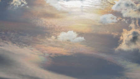 The abstract background of the evening sky, Beautiful clouds in bright colors as if drawing a rainbow.の写真素材