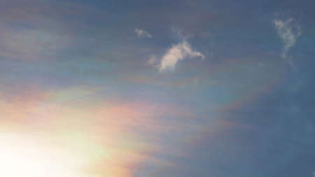 The abstract background of the evening sky, Beautiful clouds in bright colors as if drawing a rainbow.の写真素材