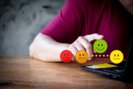 Customer service evaluation and feedback concept. best excellent business rating experience. Business people touching the virtual screen on the happy Smiley face icon Satisfactionの写真素材