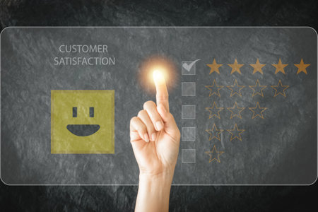 Business pressing star emoticon on virtual touch screen. Customer service evaluation concept. Concept of satisfaction and customer service. business growth.の写真素材
