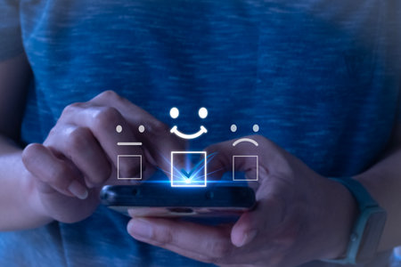 Customer service and Satisfaction concept, Business people touching the virtual screen on the happy Smile face icon to give satisfaction in service. rating very impressed.の写真素材