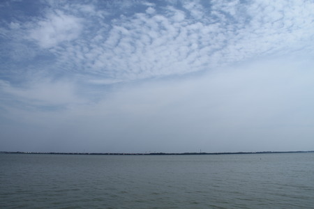 Seascape with clouds in the skyの写真素材