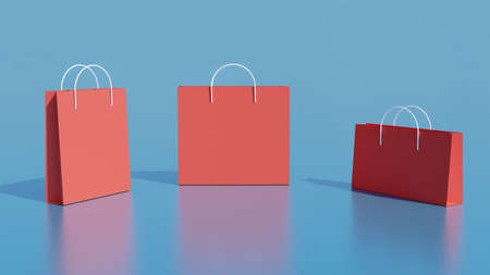 3d paper bags on a colored backgroundの写真素材