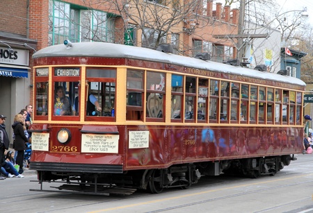 An old Toronto streetcar during a street paradeのeditorial素材