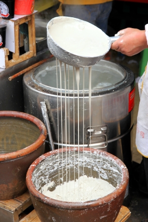 A noodles maker selling in a street of old Chongqingの写真素材