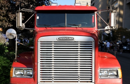 Toronto, Canada, September 3, 2012 - The front grille of a Freightliner truckのeditorial素材