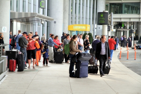 TORONTO - MAY 10: People at the Pearson Airport on May 10, 2013 in Toronto. In 2011, Toronto Pearson handled 33.4 million passengers and 428,477 aircraft movements.のeditorial素材