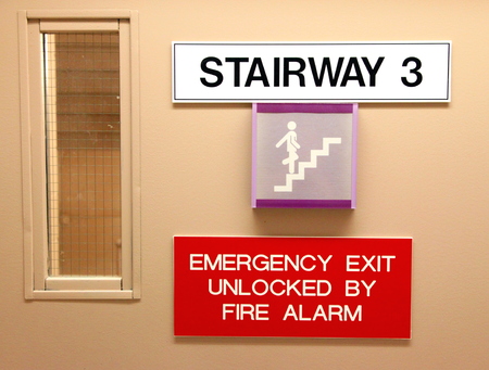 Signs indicating a stairway in a hospitalの写真素材