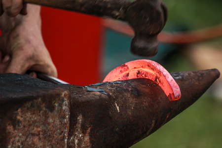 horseshoe being crafted by a skilled blacksmith/farrier